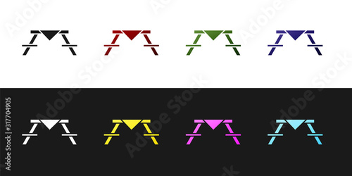 Set Picnic table with benches on either side of the table icon isolated on black and white background. Vector Illustration