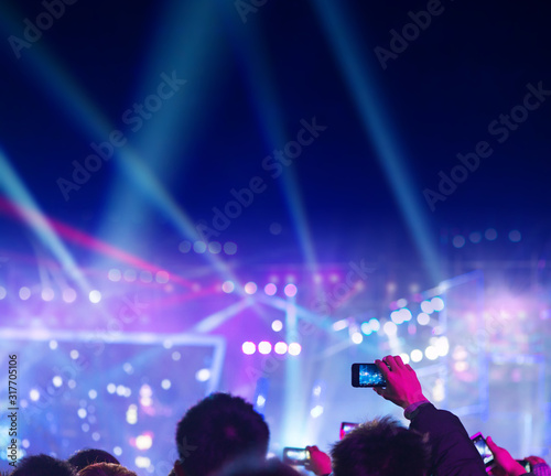 audience silhouettes at a live music concert © zorabc