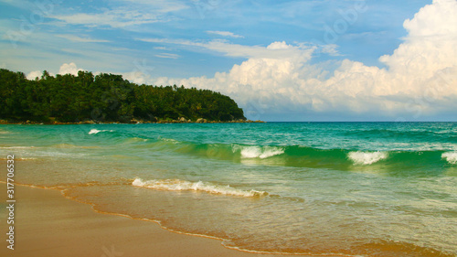 Karon beach, tranquil sea and wonderful cloudy sky, Phuket, Thailand