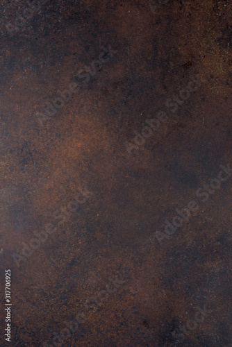 Textured background painted in brown color with different shades