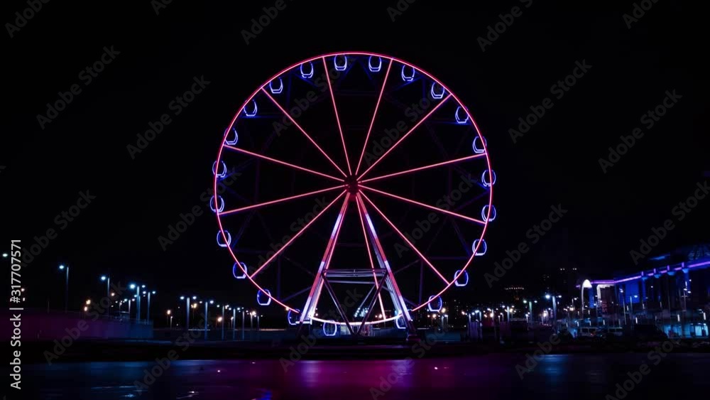 Time lapse ferris wheel at the amusement park at night. Time lapse ferris wheel at the amusement park at night.