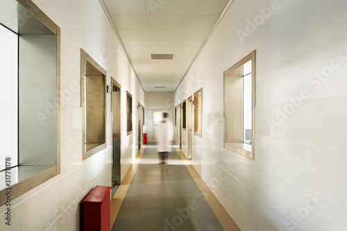 Wallpaper Mural people walking in the corridor of hospital laboratory, blur motion Torontodigital.ca