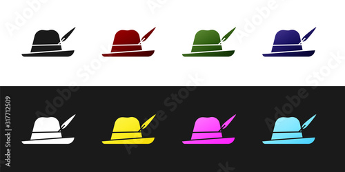 Set Oktoberfest hat icon isolated on black and white background. Hunter hat with feather. German hat. Vector Illustration
