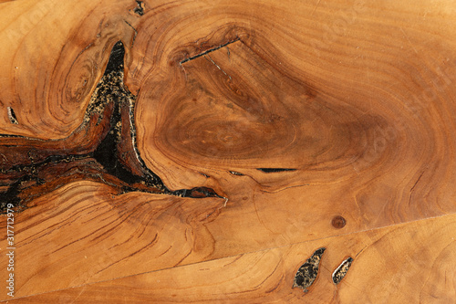 Cherry wood structure at a table