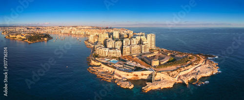 Fototapeta Naklejka Na Ścianę i Meble -  Beautiful aerial scenery of the rocky coast in Sliema, Malta
