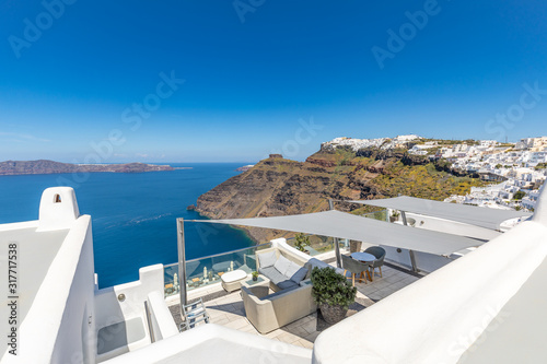 White architecture and amazing sea view from caldera. Fantastic summer vacation and travel destination scenic. Beautiful landscape, picturesque nature background