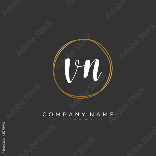 Handwritten initial letter V N VN for identity and logo. Vector logo template with handwriting and signature style.