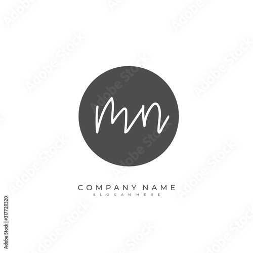 Handwritten initial letter M N MN for identity and logo. Vector logo template with handwriting and signature style.