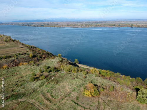 Danube river separating Romania from Serbia, sunny summer day photo