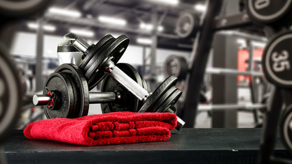 Fotobehang Fitness Zwart bureaublad met wazige sportschool  © magdal3na