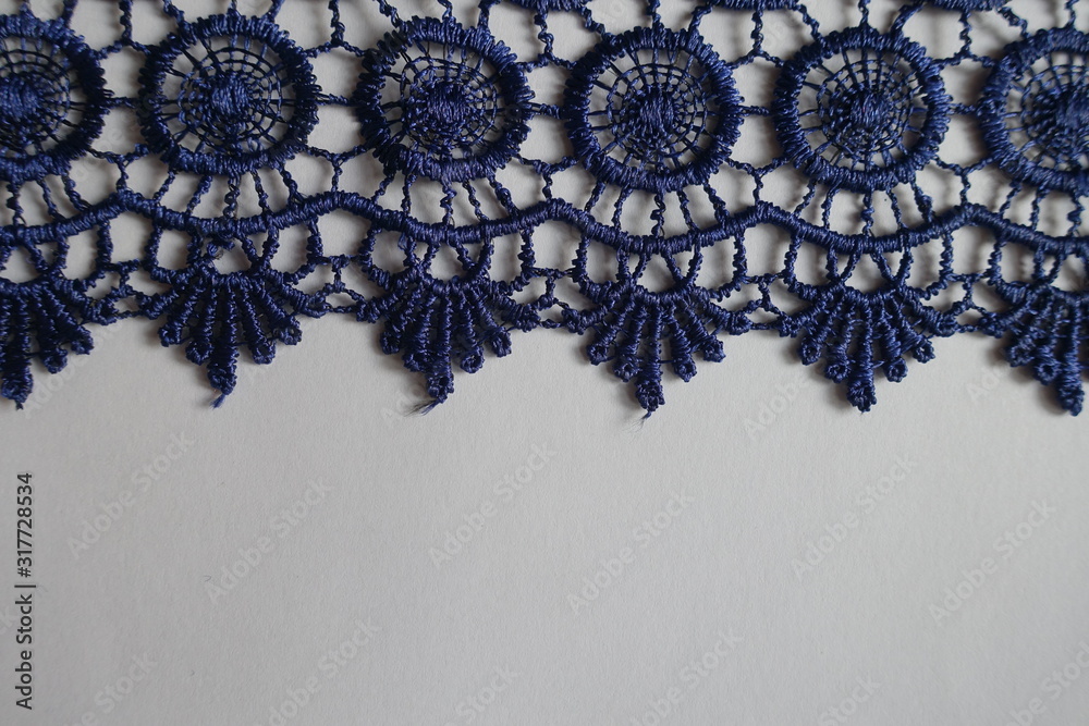 Horizontal edge of navy blue crochet lace Horizontal edge of navy blue crochet lace