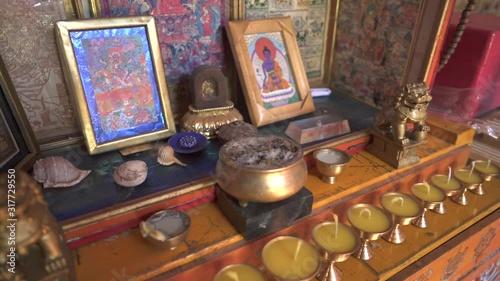 Religious shaman buddhist and tengri belief. Incense objects candle small sculpture. Tengrism are Heavenly-Father Tenger Etseg Earth Mother Eje Gazar Eej. It involves animism totemism ancestor worship
