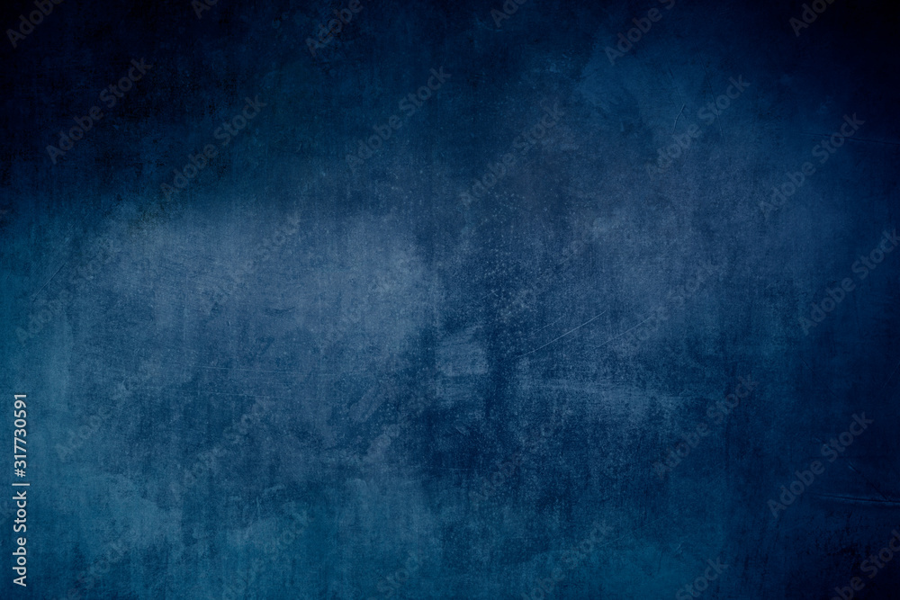 Old blue grungy backdrop or texture