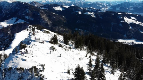 Aerials form Erl Erlberg Kufstein  Austria.
Hiking top of the mountains in winter.
Snow, beautiful landscapes, sunny day. photo