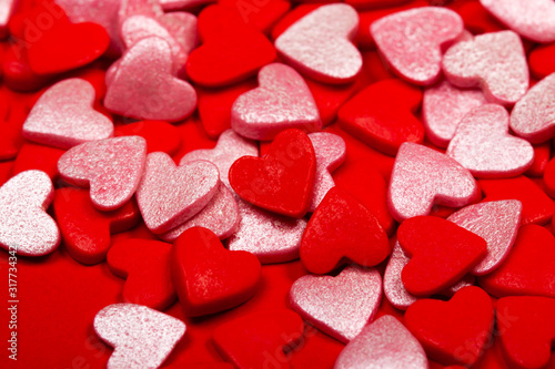 Lots of red and pink hearts. The concept of St. Valentine's Day, love, sweets