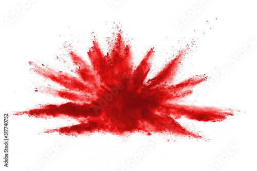 Launched red powder on white background.