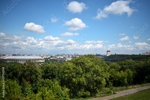 Moscow, Russia - July 8, 2019: The view of Moscow and cloudy blue sky from the Sparrow Hills observation deck on a sunny day
