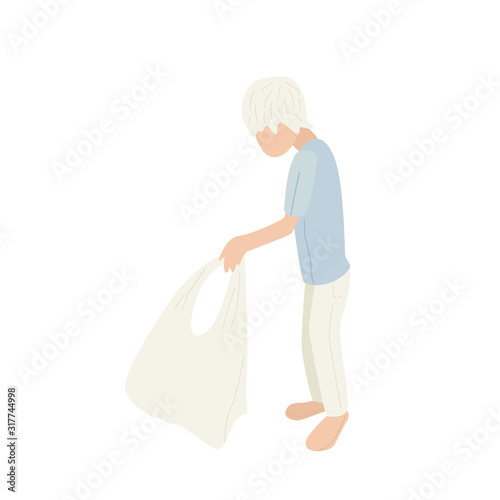 young man taking a trash bag
