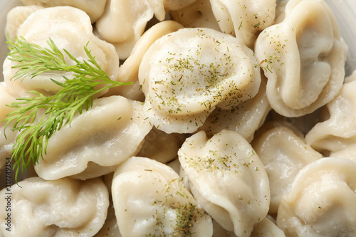 Dumplings with spices texture background, close up