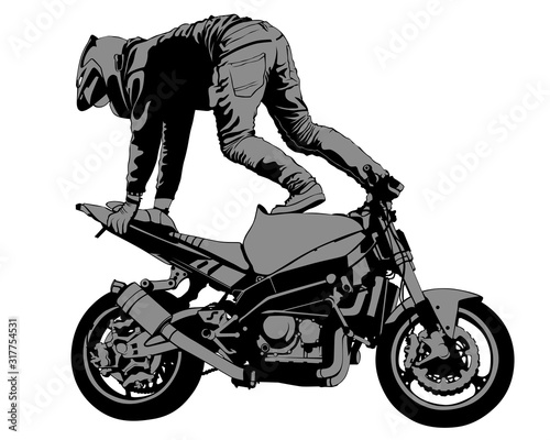 Young man on sports bike performs tricks. Isolated silhouette on a white background