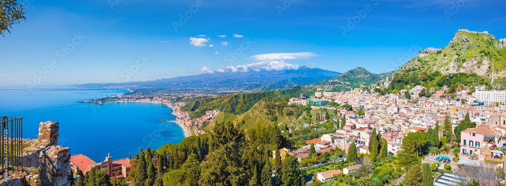 Aerial panoramic view of Taormina located in Metropolitan City of Messina, on east coast of Sicily island, Italy.