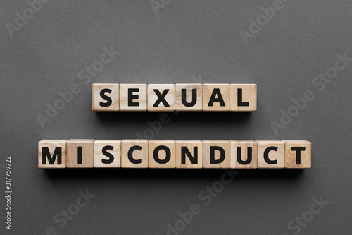 Obraz na plátně Sexual misconduct - words from wooden blocks with letters, sexual misconductconc