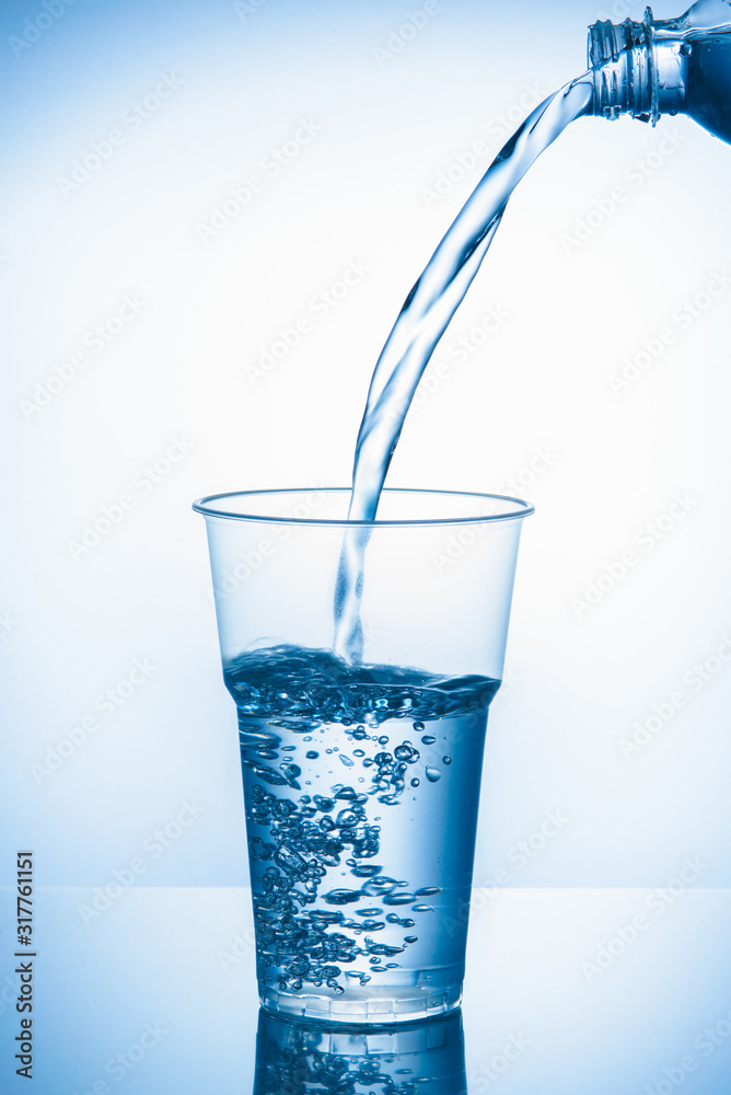 pouring clear water frosted plastic cup pouring clear water frosted plastic cup