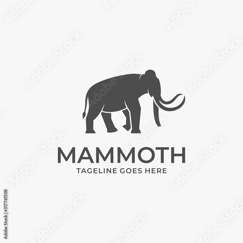 Vector Logo Illustration Mammoth Walking Silhouette
