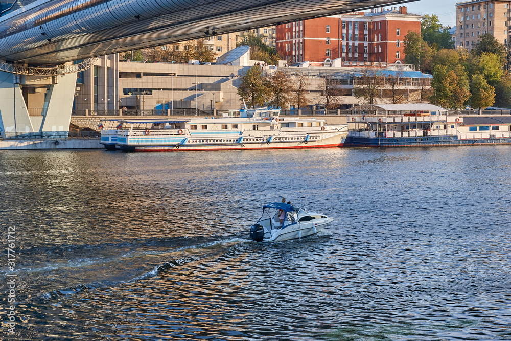 Moscow, Russia - September 12, 2019: Boats on the Moscow River under the Bagration Bridge