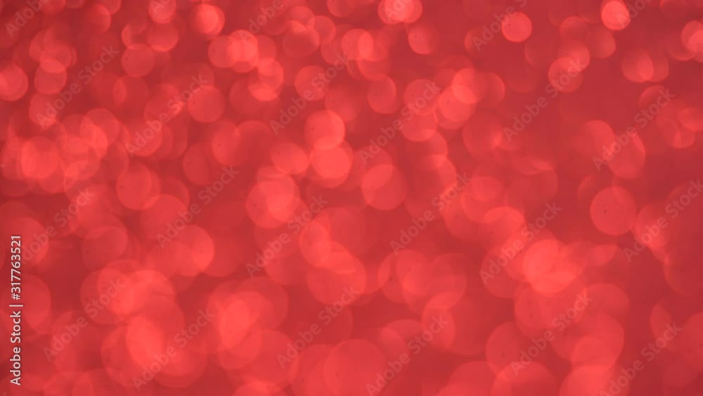 Blurred red background with holiday bokeh, abstract Blurred red background with holiday bokeh, abstract