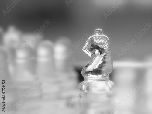 Chess piece on chessboard  competition success and strategy game play  vintage color tone process with blurred   background  Traditional holiday games