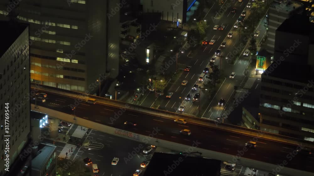 View of the cars passing through the skyway road in Nagoya Japan View of the cars passing through the skyway road in Nagoya Japan