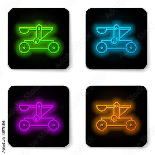 Canvas Print Glowing neon line Old medieval wooden catapult shooting stones icon isolated on white background