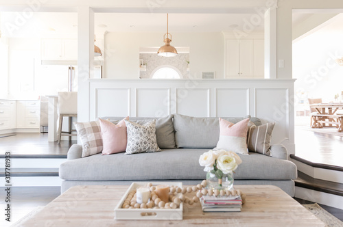 interior white sitting room and kitchen