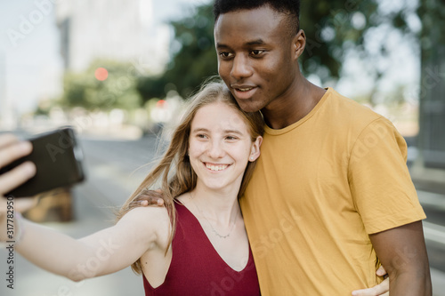 Boy and girl in love taking a selfie