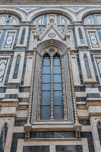 Architectural fragments of Cathedral Santa Maria del Fiore (or Duomo di Firenze), located in Piazza del Duomo, was built between 1296 and 1436. Cathedral is one of largest in world. Florence, Italy. © dbrnjhrj