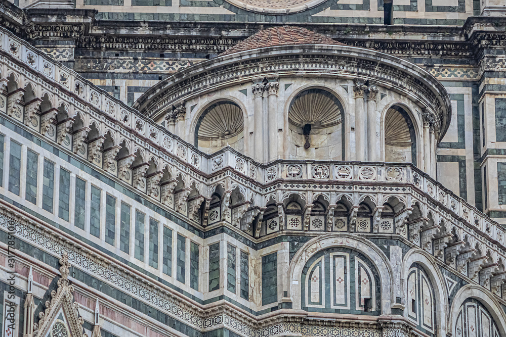 Architectural fragments of Cathedral Santa Maria del Fiore (or Duomo di Firenze), located in Piazza del Duomo, was built between 1296 and 1436. Cathedral is one of largest in world. Florence, Italy.