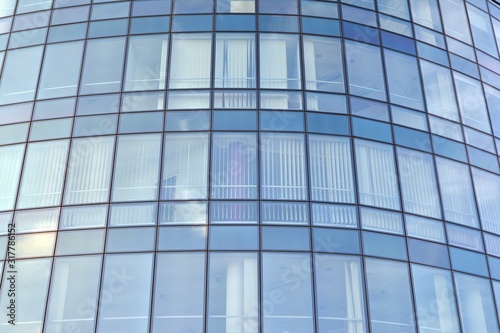 Abstract reflection of modern city glass facades