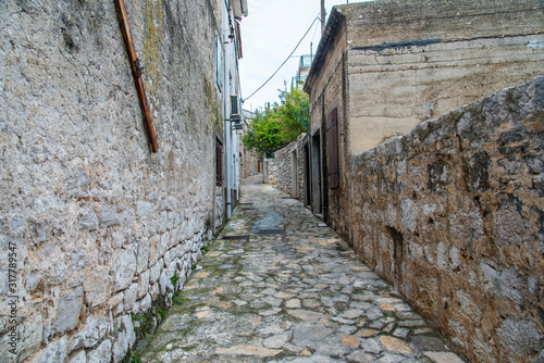 Narrow street in the fishing village  Murter  Croatia  Europe