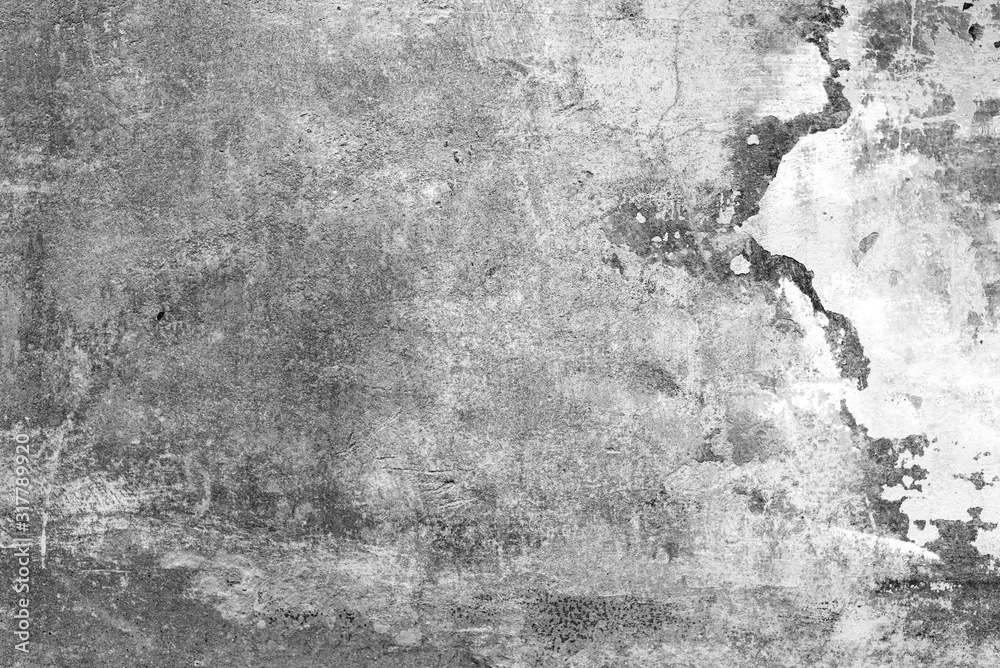 Fototapeta premium Texture of a concrete wall with cracks and scratches which can be used as a background