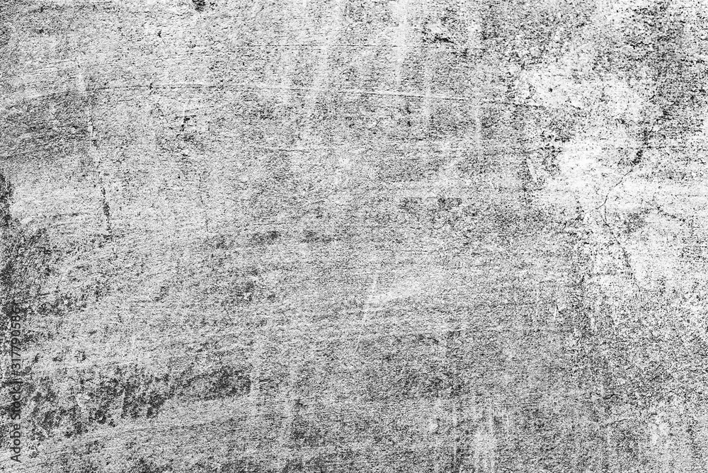 Texture of a concrete wall with cracks and scratches which can be used as a background Texture of a concrete wall with cracks and scratches which can be used as a background