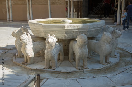 Lions court in Nasrid moresque palace of Alhambra. The palace is UNESCO World Heritage and the official number one travel destination of Spain.