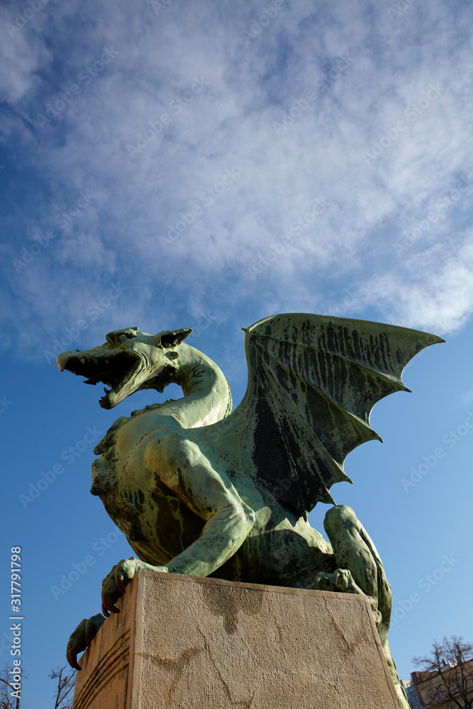 Dragon statue on the Dragon Bridge in Ljubljana, Slovenia