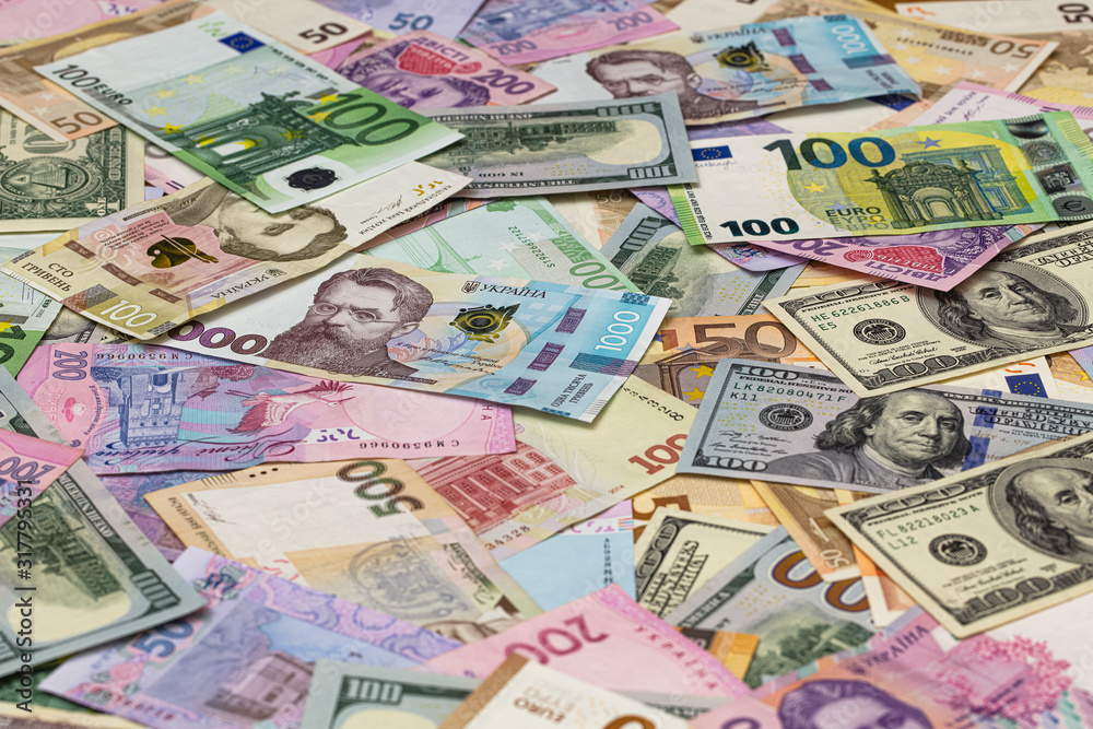 Closeup of dollar, euro and hryvnia banknotes Closeup of dollar, euro and hryvnia banknotes