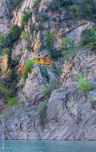 Path carved on the rock, Montrebei Gorge - Congost de Mont-rebei, Noguera Ribagorzana river, Montsec Range, The Pre-Pyrenees, Lleida, Catalonia, Spain, Europe photo