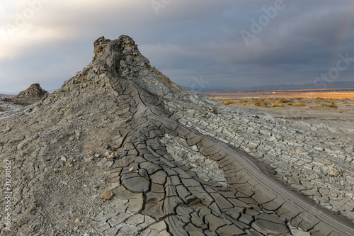 Mud volcanoes of Gobustan near Baku, Azerbaijan. mud mountain against the background of a stormy sky