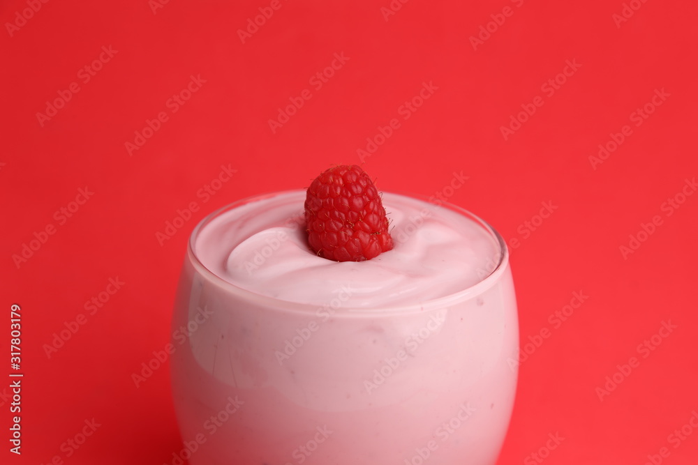 delicious raspberry yogurt in color background delicious raspberry yogurt in color background