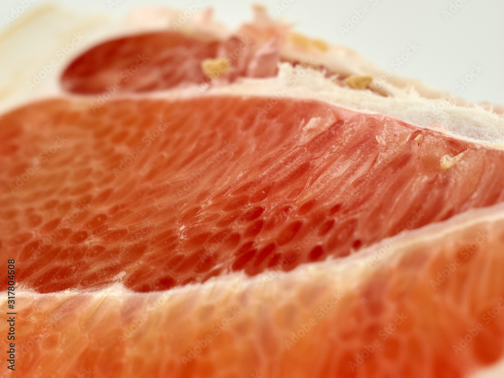 Fresh and juicy pomelo and its slices.Isolate on a white background Fresh and juicy pomelo and its slices.Isolate on a white background