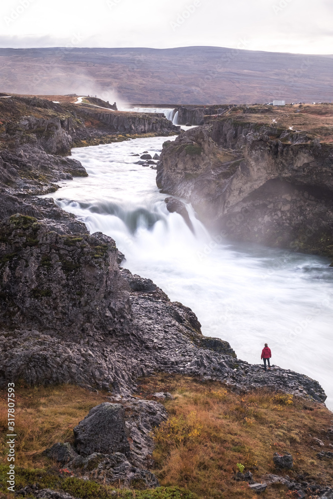 Woman in front of Detifoss in iceland