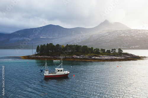Classic Norwegian cold panoramic landscape of Efjorden fjord, Ballangen municipality, Nordland county, Ofoten district, Norway with Efjord Bridges, Stortinden mountain, Northern Norway © tsuguliev